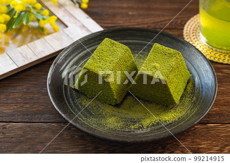 Matcha Baumkuchen Served with Fresh Cream 99214915