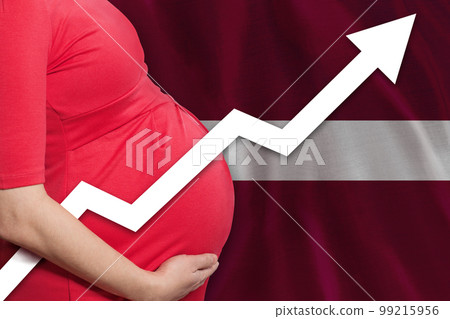 Latvian pregnant woman on flag of Latvia background. Birth rate up 99215956