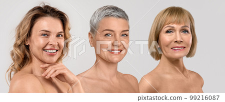 Middle aged and elderly ladies posing half-naked on studio background Middle aged and elderly ladies posing half-naked on studio background 99216087