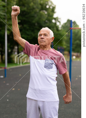 Senior man doing warming up exercises Senior man doing warming up exercises 99216634