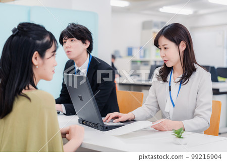 Staff who work as counters at a real estate company Staff who work as counters at a real estate company 99216904