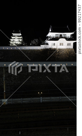 Fukuyama Castle illuminated from the Shinkansen platform, the castle tower and Tsukimi Yagura, and the castle walls of Sama Fukuyama Castle illuminated from the Shinkansen platform, the castle tower and Tsukimi Yagura, and the castle walls of Sama 99217437