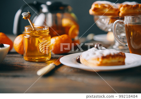 Homemade pastries on beautifully served table decorated in rustic style 99218484
