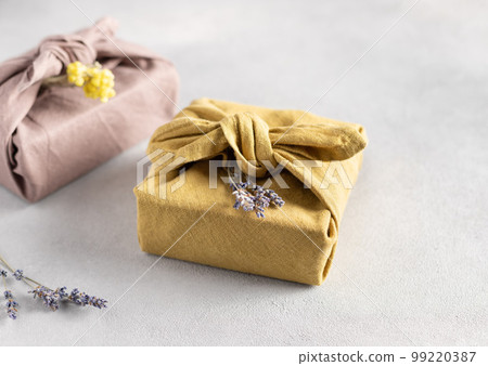 reusable sustainable gift wrapping in linen fabric. Furoshiki gifts. reusable sustainable gift wrapping in linen fabric. Furoshiki gifts. 99220387