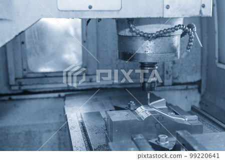 The CNC milling machine cutting injection mold part by solid flat end mill tool. The CNC milling machine cutting injection mold part by solid flat end mill tool. 99220641