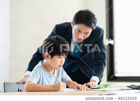 Boy studying at a cram school 99222420