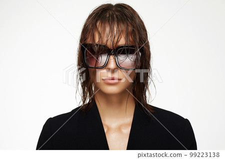 young woman with Wet Hair and Glasses 99223138
