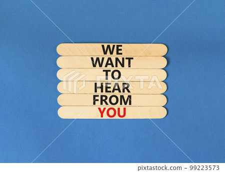 Support symbol. Concept words We want to hear from you on wooden stick. Beautiful blue table blue background. Business support we want to hear from you concept. Copy space. 99223573