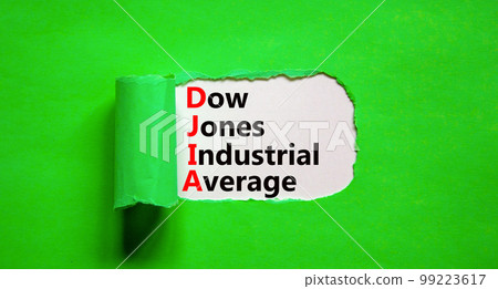 DJIA Dow Jones industrial average symbol. Concept words DJIA Dow Jones industrial average on white paper on beautiful green background. Business DJIA Dow Jones industrial average concept. Copy space DJIA Dow Jones industrial average symbol. Concept words DJIA Dow Jones industrial average on white paper on beautiful green background. Business DJIA Dow Jones industrial average concept. Copy space 99223617