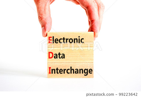 EDI electronic data interchange symbol. Concept words EDI electronic data interchange on wooden blocks on a beautiful white background. Business and EDI electronic data interchange concept. Copy space EDI electronic data interchange symbol. Concept words EDI electronic data interchange on wooden blocks on a beautiful white background. Business and EDI electronic data interchange concept. Copy space 99223642