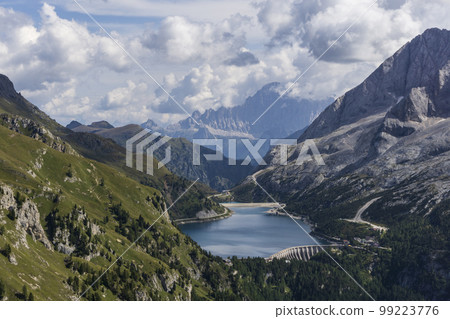 Great view of the Dolomites. Lago Fedaia and Marmolada. 99223776