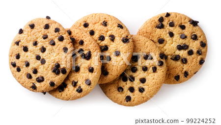 Chocolate chip cookies scattered on a white background.Top view 99224252
