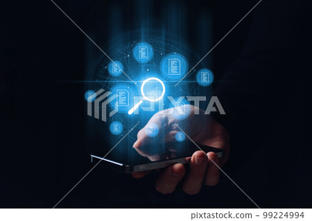 A person holding a smartphone leads the search and verification of electronic documents. Hologram graphics. 99224994