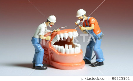 Miniature people repairing a set of false teeth, generative Ai 99225501