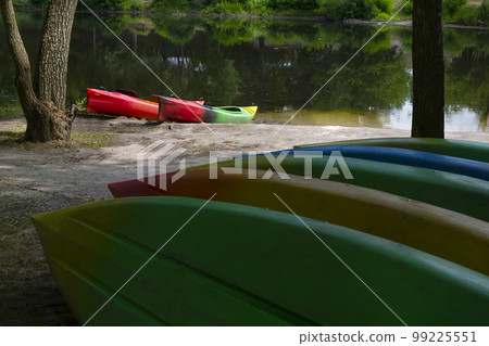 Boat parking on the river in nature. Rent kayaks, boats 99225551