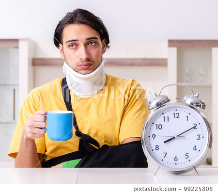Young man after car accident suffering at home 99225808