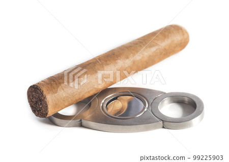 Cuban cigar, and cigar scissors close-up, on a white background 99225903