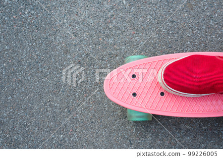 Skate and leg closeup. Top view. Healthy lifestyle Skate and leg closeup. Top view. Healthy lifestyle 99226005