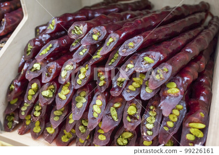 Traditional Georgian, homemade sweets with hazelnuts, walnuts, pistachios, grape juice and honey. 99226161