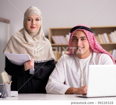 Pair of arab man and woman Pair of arab man and woman 99226328