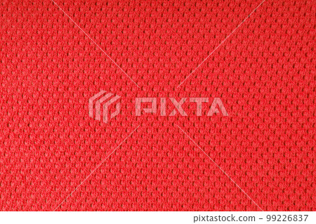 Bright red knitwear wool fabric texture background. Abstract textile backdrop 99226837