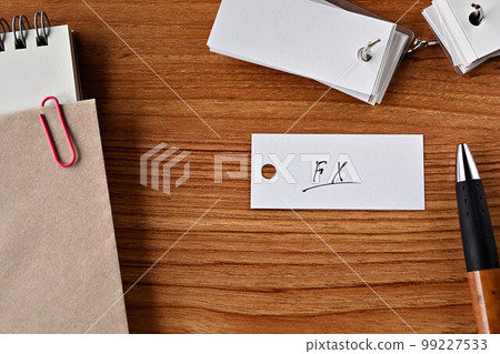 Desk with a word book written FX 99227533