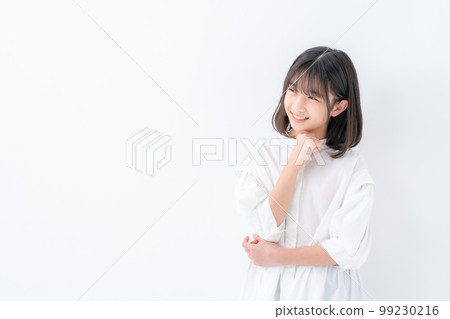 Elementary school girl worried 99230216