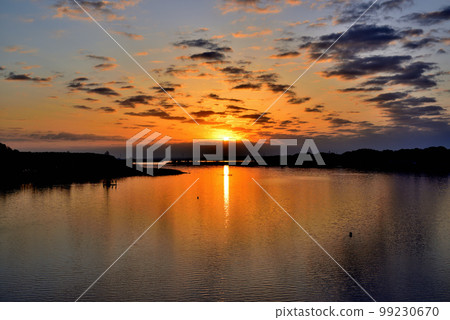 The view of Teganuma at sunrise from Tega Ohashi Bridge, Chiba Prefecture The view of Teganuma at sunrise from Tega Ohashi Bridge, Chiba Prefecture 99230670