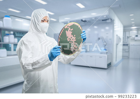 Worker or engineer wears medical protective suit or white coverall suit with silicon wafer 99233223