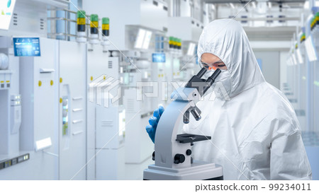 Worker wears medical protective suit or white coverall suit look through microscope in laboratory Worker wears medical protective suit or white coverall suit look through microscope in laboratory 99234011