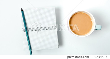 Coffee Cup Standing on Desk. Important infrormation written on paper. Different Office Supplies, Pencils, Pens, Marckers. Computer keyboard. Text on wood table. 99234594