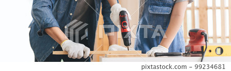Closed up hand father and son tech carpenter home skill family activity banner size background Closed up hand father and son tech carpenter home skill family activity banner size background 99234681