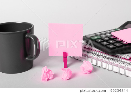 Coffee Cup Standing on Desk. Important infrormation written on paper. Different Office Supplies, Pencils, Pens, Marckers. Computer keyboard. Text on wood table. Coffee Cup Standing on Desk. Important infrormation written on paper. Different Office Supplies, Pencils, Pens, Marckers. Computer keyboard. Text on wood table. 99234844