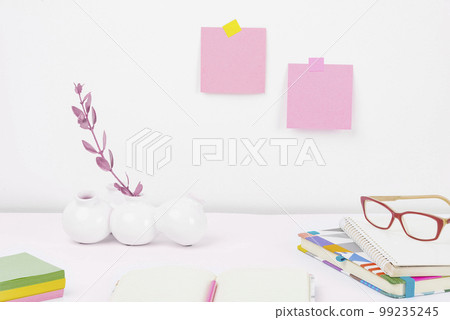 Office Supplies Over Desk With Keyboard And Glasses And Coffee Cup For Working Remotely, Assorted School Utilities For Studying With Hot Drink And Eyeglasses. Office Supplies Over Desk With Keyboard And Glasses And Coffee Cup For Working Remotely, Assorted School Utilities For Studying With Hot Drink And Eyeglasses. 99235245