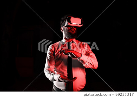 Man Wearing Vr Glasses And Presenting Important Messages Between Hands. Businessman Having Virtual Reality Eyeglasses And Showing Crutial Informations. 99235317