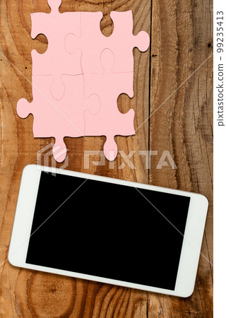 Mobile Phone With Important Message On Desk With Empty Pink Puzzels And Notes. Cellphone Screen With Crutial Informations On Table With Notepad And Memos. Mobile Phone With Important Message On Desk With Empty Pink Puzzels And Notes. Cellphone Screen With Crutial Informations On Table With Notepad And Memos. 99235413