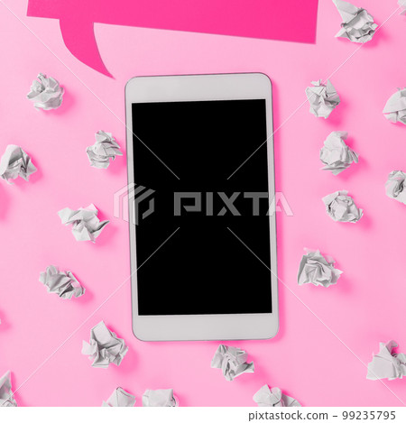 Important Message Presented On Phone On Desk With Paperwraps, Paper. Crutial Information Shown On Cellphone Screen Placed On Table. New Ideas On Mobile Phone. 99235795