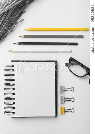 Photo With Pens Pencils Rullers Calculators. Notebook and Colored Paper Stickers Lying On White Desk. Multiple Assorted Collection Office Stationery. Postcards. Photo With Pens Pencils Rullers Calculators. Notebook and Colored Paper Stickers Lying On White Desk. Multiple Assorted Collection Office Stationery. Postcards. 99236628