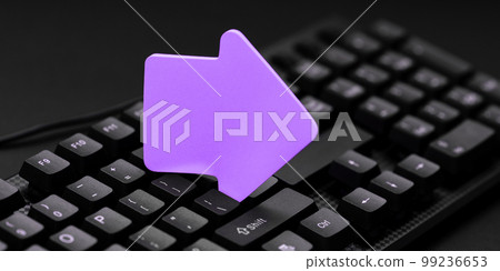 Colored sticker lying on black keyboard. Important information written over paper. Image with school supplies. Multiple Assorted Collection Office Stationery. Colored sticker lying on black keyboard. Important information written over paper. Image with school supplies. Multiple Assorted Collection Office Stationery. 99236653