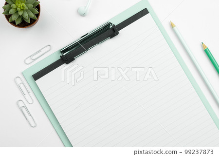 Different Office Supplies, Colored Stickers, Notebooks. Pens, Pencils, Rullers, Marckers. Different School Items. Important information. Accessories lying on desk. 99237873