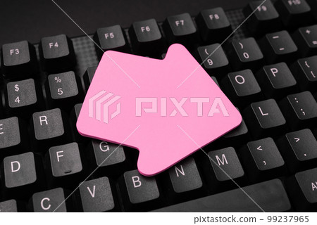 Colored sticker lying on black keyboard. Important information written over paper. Image with school supplies. Multiple Assorted Collection Office Stationery. Colored sticker lying on black keyboard. Important information written over paper. Image with school supplies. Multiple Assorted Collection Office Stationery. 99237965