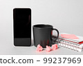 Mobile Phone Screen With Important Ideas On It And Paperwraps On It On Desk Near Coffee Cup. Cellphone With Crutial Informations And Memo Attached To It. 99237969