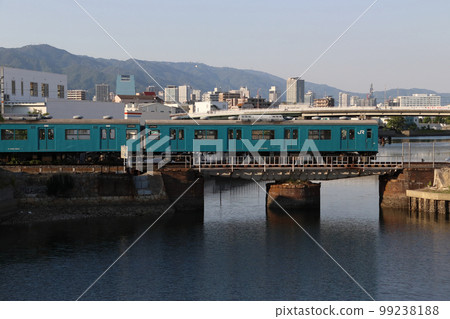 Hyogo Canal: Wadamisaki Line 103 series train crossing the Wada Swing Bridge Hyogo Canal: Wadamisaki Line 103 series train crossing the Wada Swing Bridge 99238188