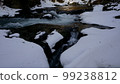 mountain stream in winter 99238812