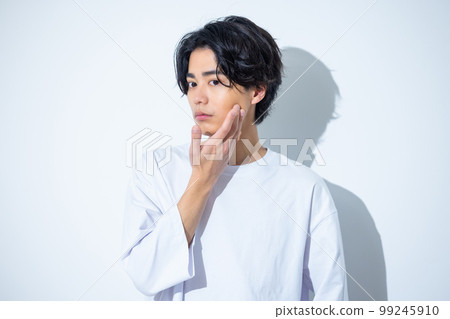 Man in white t-shirt Man in white t-shirt 99245910