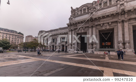 Panorama showing Milano Centrale timelapse - the main central railway station of the city of Milan in Italy. Panorama showing Milano Centrale timelapse - the main central railway station of the city of Milan in Italy. 99247810