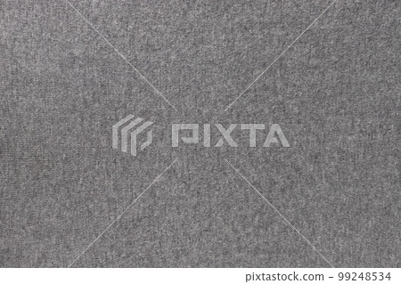 Gray knitted clothes. knitted texture background. Gray knitted clothes. knitted texture background. 99248534