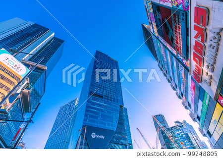 Cityscape of Tokyo, Japan View of office buildings and Bic Camera from Shibuya's Miyamasuzakashita intersection Cityscape of Tokyo, Japan View of office buildings and Bic Camera from Shibuya's Miyamasuzakashita intersection 99248805