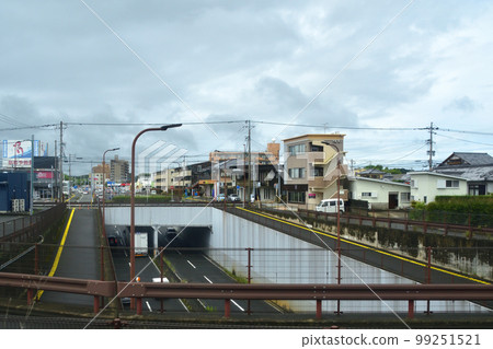 Scenery from Nobeoka Station on the Nippo Main Line to Miyazaki Station on a rainy morning in the summer of 2022 Scenery from Nobeoka Station on the Nippo Main Line to Miyazaki Station on a rainy morning in the summer of 2022 99251521