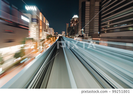 Motion blurred of train moving inside tunnel with 99251801